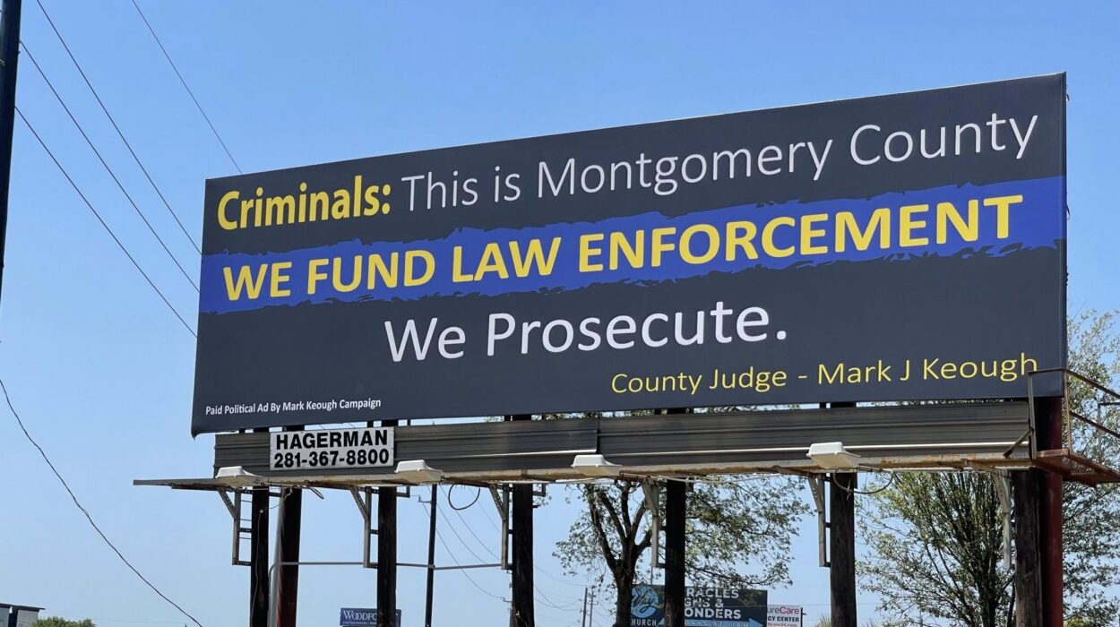 Montgomery County Judge Mark Keough stands with Sheriff's Deputies and Constables to announce the new Law Enforcement Pay Parity Plan.