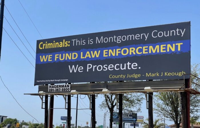 Montgomery County Judge Mark Keough stands with Sheriff's Deputies and Constables to announce the new Law Enforcement Pay Parity Plan.